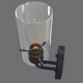 Modern Wall Sconce with Transparent Glass Shade Black Metal Base and Vintage Filament Bulb