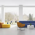 Blue Yellow Sofa And White Coffee Table Set With Orange Chair In Bright Room