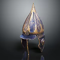 Intricate Blue And Gold Decorated Ancient Helmet With Pointed Top And Historical Weapon Design