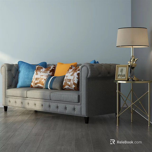Gray Three Seater Sofa With Colorful Pillows And Side Table With Lamp 3d model
