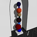 Colorful Sphere Sculpture Hanging In Transparent Arched Structure With White Wall Background And Illuminated Effect
