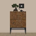 Traditional Carved Wooden Entryway Console Cabinet With Potted Plant And Framed Artwork