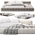 Modern Gray Velvet Double Bed With White Sheets And Cozy Blanket