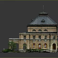 Scenic View of Yellow Classical Building With Gray Roof Symmetric Shrubs and Small Trees