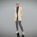 Bald Woman In Beige Blazer Black Turtleneck Dark Jeans White Sneakers Standing Against Gray Background