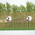 Wooden Partition With Circular Cutouts And Bamboo Plants In Garden