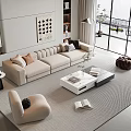 Modern Beige Sofa And White Coffee Table Set With Cushions Books Plant And Large Windows