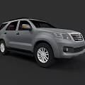 Stylish Gray SUV Exterior Design With Alloy Wheels And Front Grille Details