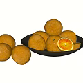 Fresh Ripe Oranges Arranged in Black Plate with Sliced and Whole Pieces on Light Surface