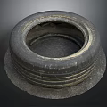 Old Car Tire With Worn Tread Placed On Circular Base Against Dark Background 3d model