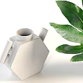 Gray Hexagonal Vase With Handles And Black Cylindrical Vase Holding Green Leafy Plants