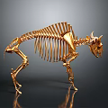 Golden Horned Animal Skeleton With Detailed Bone Structure And Metallic Finish On Gray Background
