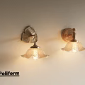 Poliform Brass Wall Sconces With Decorative Glass Shade On Light Wall