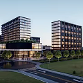 Modern High Rise Buildings With Glass Curtain Walls And Green Trees Along Road