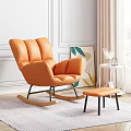 Orange Rocking Leisure Chair With Matching Footstool And Decorative Painting In Modern Interior