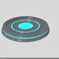 Gray Circular Electronic Device With Blue Central Panel And Light Rings