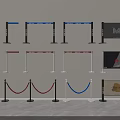 Colorful Metal Stanchion Railings With Red Blue White Ropes And Advertising Signboards