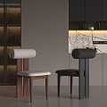 Modern Dining Chairs In Open Kitchen With White Upholstered Seats Black Frames And Marble Countertop