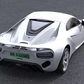 Sleek White Sports Car Aerodynamic Exterior On Pavement