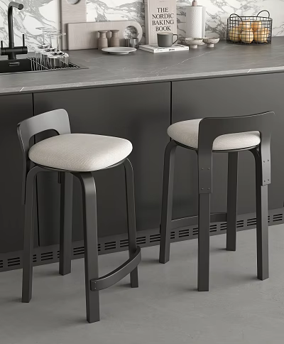 Modern Bar Stools With Black Frame And Light Colored Seats In Kitchen Bar Area 3d model