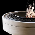 Round Wooden Fireplace With Burning Flames And Black Pebble Interior
