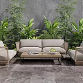 Outdoor Sofa Set With Rattan Armchairs Coffee Table And Green Plants Against Gray Wall