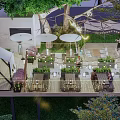 Garden Landscape Design with Outdoor Terrace Green Plants String Lights and Seating