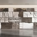 Natural Stone Accent Wall With Mixed Color Tiles And Textured Surfaces For Modern Home Decor