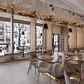 Modern Café Interior With Rattan Columns White Armchairs And Wooden Coffee Tables