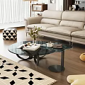 Modern Glass Coffee Table With Books Vase Plant And Sofa In Living Room