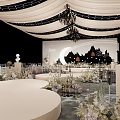 Elegant Banquet Hall With White Drapes Chandeliers Stage Moon Silhouette And Floral Decor