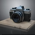 Vintage PRAKTICA Film Camera With Classic Lens On Wooden Display Base
