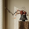 Black Vase Arrangement With Red Pinecones Orange Flowers On Wooden Stand And Window Blind Shadows