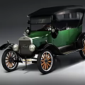 Vintage Green Ford Car With Black Top And Orange Spoked Wheels