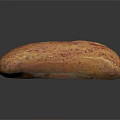 Freshly Baked Whole Grain Artisan Bread Loaf with Crusty Surface and Seeds