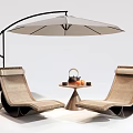 Modern Outdoor Lounge Chairs With Side Table Tea Set And Umbrella 3d model