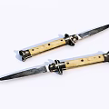 Two Sharp Knives With Wooden Handles Placed Side By Side On White Background