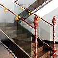 Elegant Staircase With Red Wooden Handrails Glass Balustrades Green Plant And Wooden Flooring