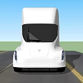 White Tesla Semi Truck Driving On Road With Aerodynamic Exterior Design