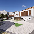 Modern School Building with White Exterior Courtyard Green Trees and Paved Ground