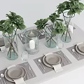 Tableware Set With Gray Plates Glass Vases Green Plants And Cutlery On Dining Table