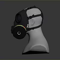 Military Black Gas Mask As Weapon Equipment With Colorful Stripe Filter Canister On Mannequin