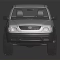 Toyota Silver Four Door Pickup Truck With Off Road Tires And Cab Bed