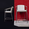 Modern Bar Stools With Metal Frame And White Seat Displayed Against Blue Red Walls