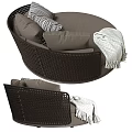 Elegant Dark Brown Rattan Sofa Stool With Round Design And Decorative Pillows