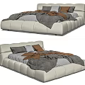 Modern Double Bed With White Leather Headboard And Gray Brown Bedding