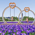 Outdoor Playground Swings With Heart Shaped Tops And Circular Frames In Purple Flower Field
