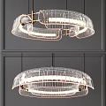 Modern Transparent Glass Circular Chandelier With Warm LED Lighting Against Gray Wall Background