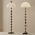Elegant Floor Lamps With Spiral Bases And White Lampshades Featuring Lace Detail