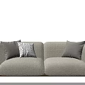 Soft Fluffy Two Seater Sofa In Cream Color With Decorative Pillows And Wooden Legs